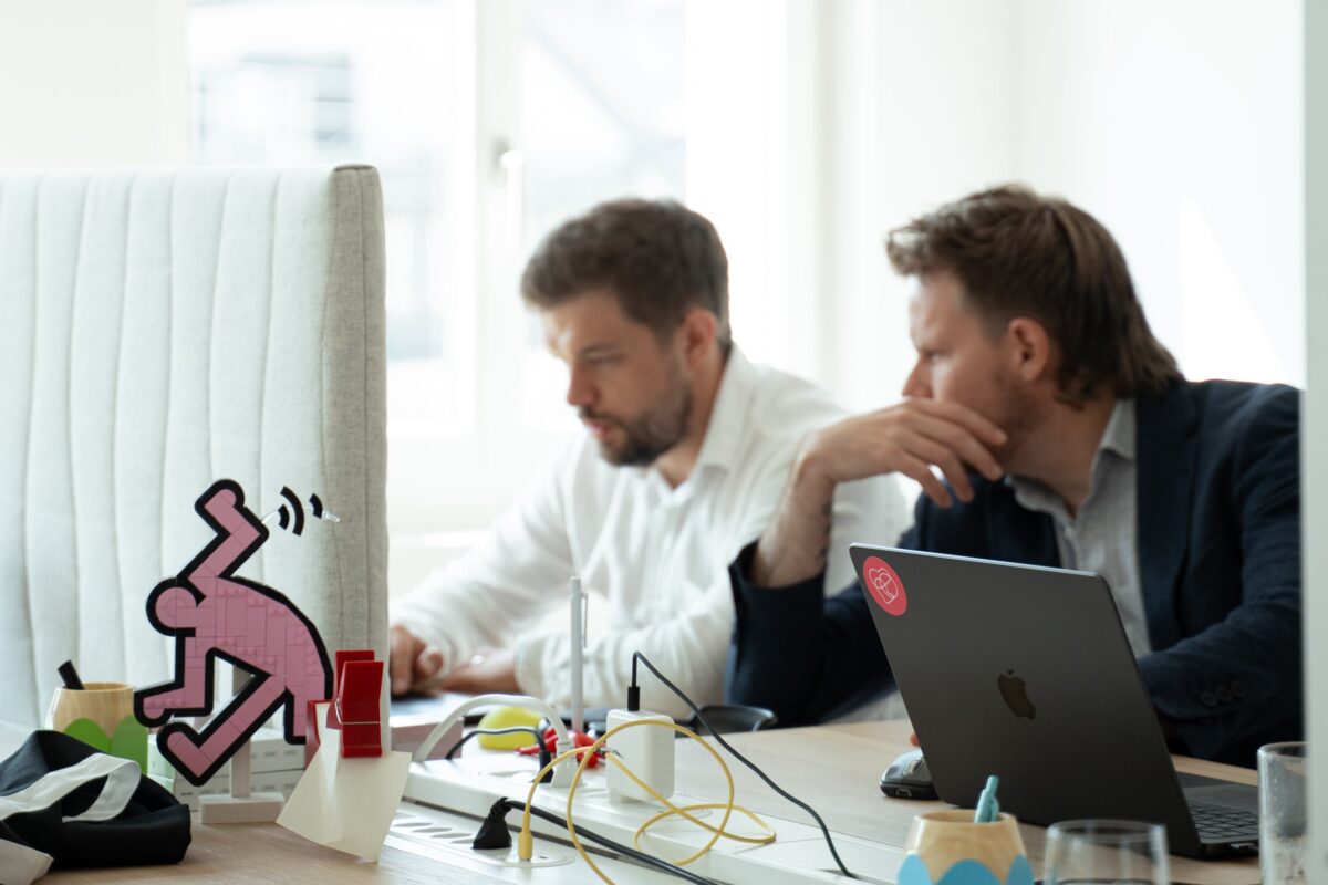 Creative team of S-Pro brainstorming ideas in the workspace