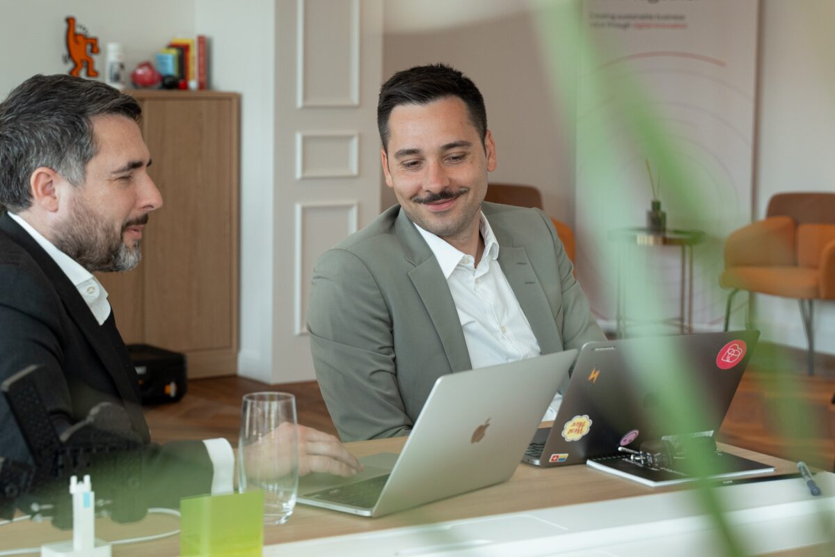 Team S-Pro at the office working together on fintech solutions